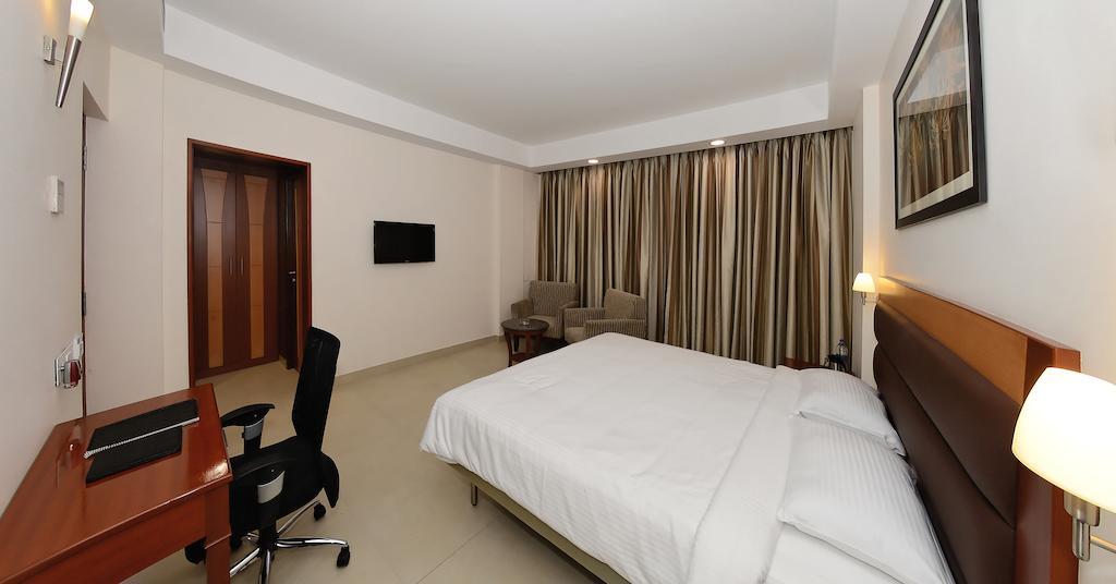 Poppys Anukula Residency Веллуру Номер фото
